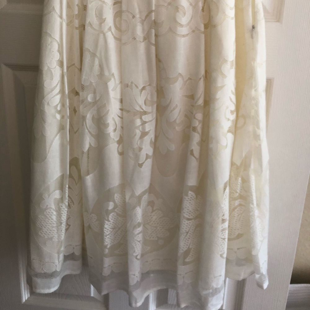 Midi white lace skirt